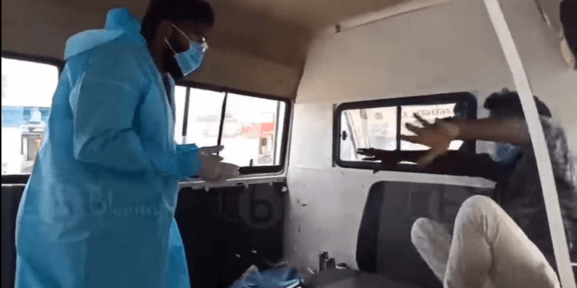 The men were so scared that they begged the officers to let them out of the van. tirrupur police ambulance vido