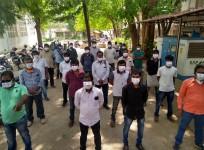 journalists wearing masks protesting outside Coimbatore district collectorate
