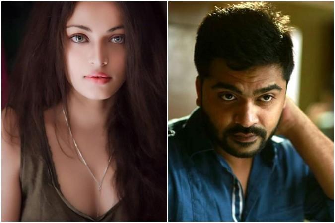 Simbu and Sneha Ullal. Simbu and Sneha Ullal