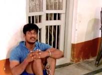CRPF jawan sitting chained in Belagavi police station Twitter