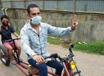 Partha Saha on Covid-19 bike Indian Express