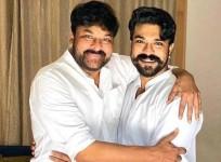 Ram Charan with his father Chiranjeevi