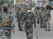 CRPF soldiers wearing masks