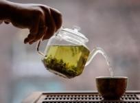 The owner of a tea house pours a cup of tea in this picture illustration taken April 25, 2020.
