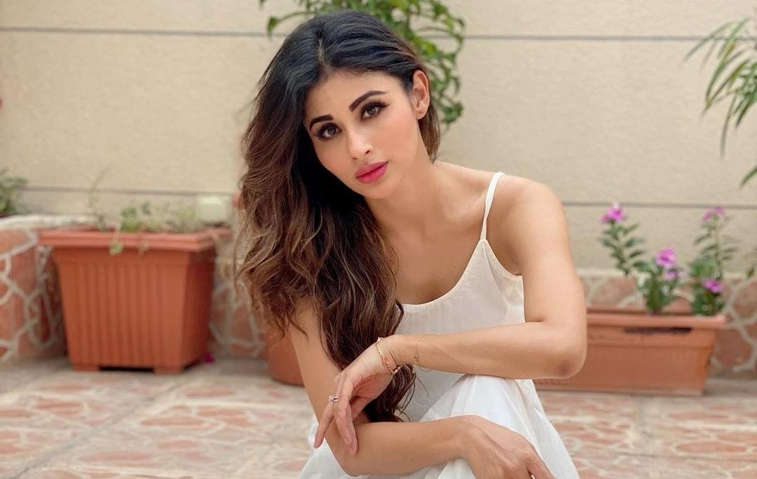 Mouni Roy Looks Cute And Sexy In White Shirt And Short Skirt Leaves Everyone Awestruck