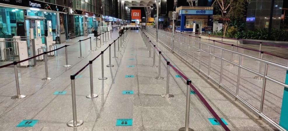 Bengaluru airport sets up social distancing measures in the terminal Bengaluru airport sets up social distancing measures in the terminal
