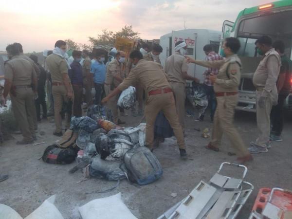 The trailer was carrying sacks of lime powder on which the around 40 workers were sleeping when it crashed into the stationary truck. auraiya accident