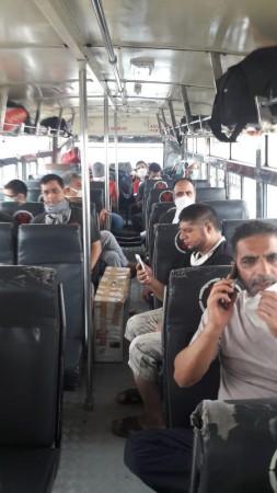 Kashmiris travelling to a railway station in Hyderabad bus