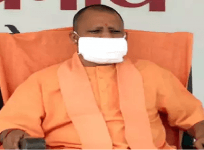 Yogi Adithyanath wearing mask
