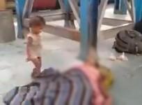 child trying to wake up his dead mother at Bihar