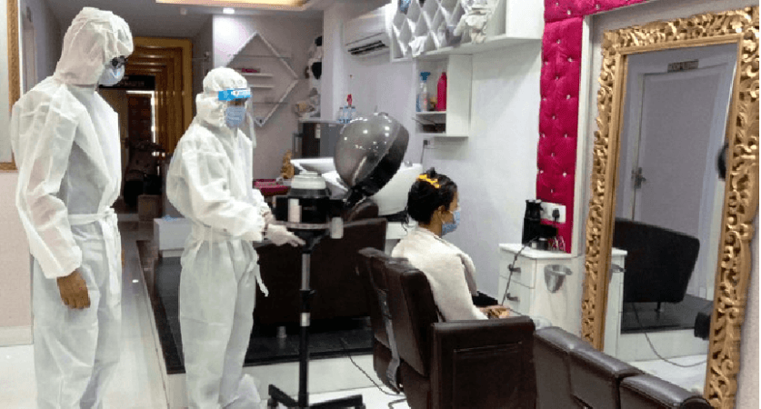 hair dresser in PPE suits hair dresser in PPE suits