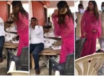 BJP leader Sonali Phogat beating up Hisar Market Committee secretary Sultan Singh with her slipper