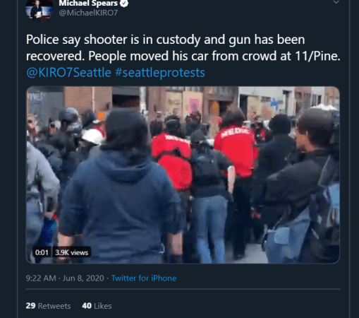 man drives car at protesters in Seattle man drives car at protesters in Seattle