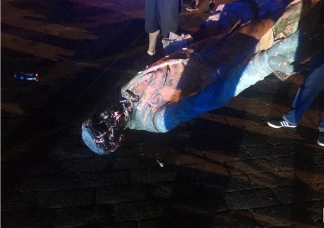 A statue of Confederate President Jefferson Davis defaced with paint after it was torn down, is seen in this picture obtained from social media June 10, 2020, in Richmond, Virginia, US. Jefferson Davis
