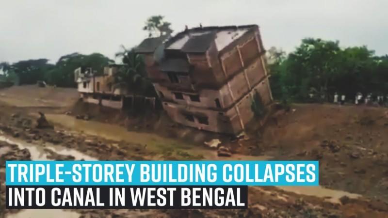 Üç katlı bina Batı Bengal'deki kanal içine çöküyor