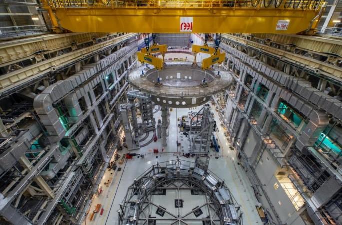 The view of lowering the cryostat base -- India's largest single procurement contribution to ITER -- the worlds largest experimental fusion facility in Saint-Paul-les-Durance, some 35 km north of Aix-en-Provence in southern France.IANS ITER