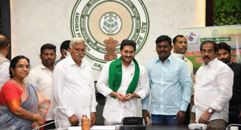 YS Jagan Mohan Reddy releases crop insurance claims of Rsv596.4 crore to 5.94 lakh farmers YS Jagan Mohan Reddy releases crop insurance claims of Rsv596.4 crore to 5.94 lakh farmers