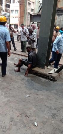 Injured workers sitting outside the blast site. tamil nadu boiler explosion
