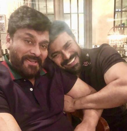 Ram Charan with Chiranjeevi Ram Charan with Chiranjeevi