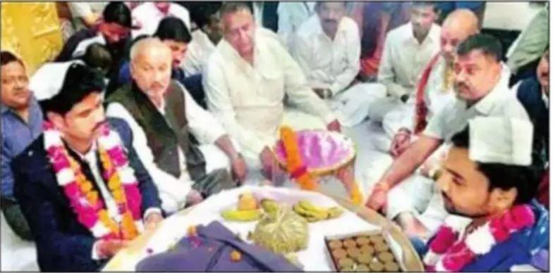 Terrorist Vikas Dubey (second from right) with Devendra Singh Bhole (third from left), BJP MP from Akbarpur Vikas Dubey