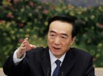 FILE PHOTO: Chen Quanguo, Communist Party Secretary of Xinjiang Uighur Autonomous Region, speaks at the meeting of Xinjiang delegation on the sidelines of the National People's Congress (NPC), at the Great Hall of the People in Beijing, China March 12, 20