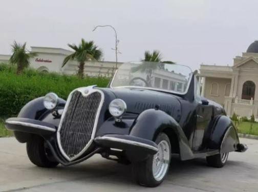 A classic car replica Classic car replica