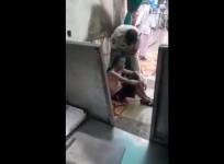 Telangana police giving a bath to elderly man