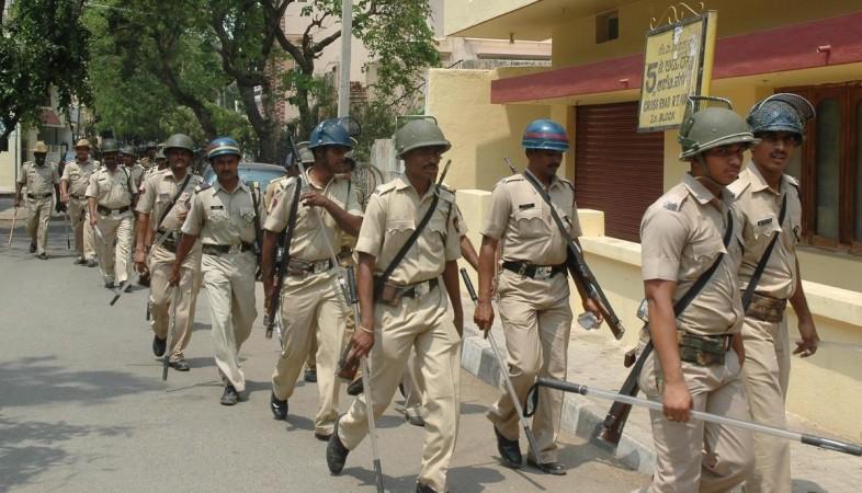 Personnel of Maharashtra State Reserve Police Force Personnel of Maharashtra State Reserve Police Force conduct a flag march ahead of 2014 Lok Sabha Election in Bangalore on April 1, 2014. (Photo: IANS)
