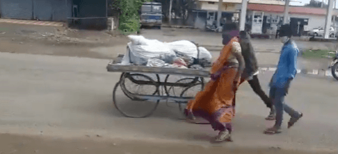 Belgaum woman pushes husband's body on cart