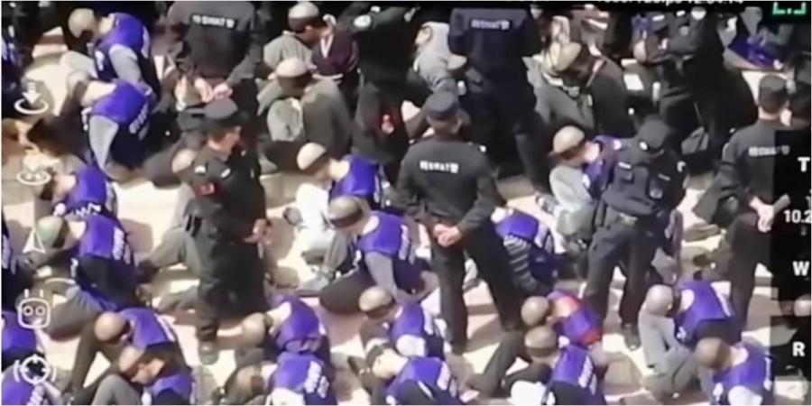 Leaked video posted to YouTube in 2019 appeared to show hundreds of male prisoner in one of the concentration camps in Xinjiang, tied up and wearing blindfolds. China concentration camps prisoners