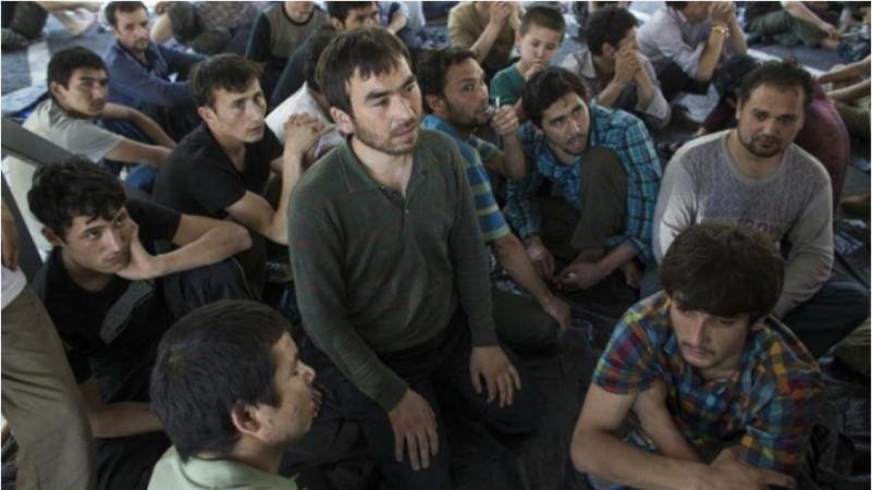china Uighur Muslims men inside the concentration camps in Xinjiang. China claims these China concentration camps