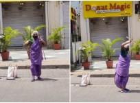 Old woman performing martial arts