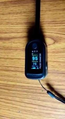 The user also shared another picture of the oximeter with a pencil in it Oximeter