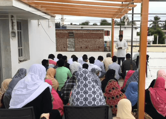 Devotees on their terrace in Tamil Nadu
