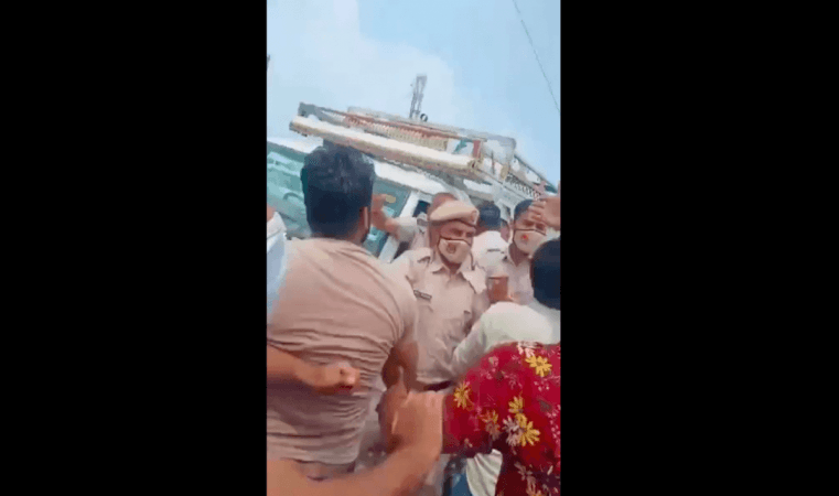 Police try to push back mob