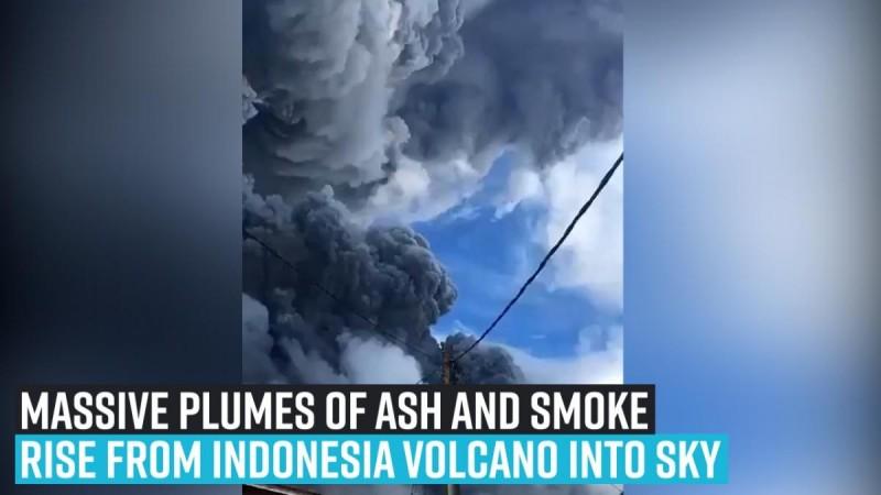 A local said: Massive plumes of ash and smoke rise from Indonesia volcano into sky