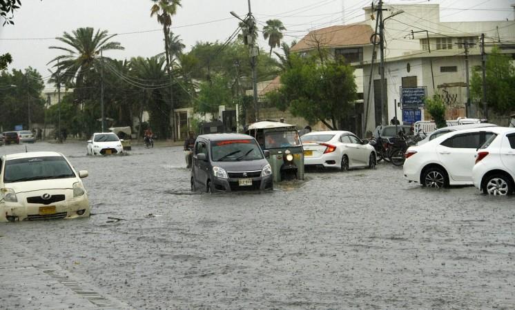 Karachi (Pakistan), July 6, 2020 (Xinhua) -- Vehicles run through a flooded road in the heavy monsoon rain in southern Pakistani port city of Karachi, on July 6, 2020 Karachi (Pakistan), July 6, 2020 (Xinhua) -- Vehicles run through a flooded road in the heavy monsoon rain in southern Pakistani port city of Karachi, on July 6, 2020