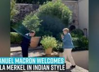 Emmanuel Macron welcomes Angela Merkel in Indian style