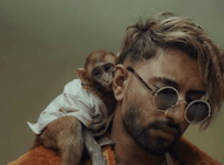 Kamaljit Singh with the monkey
