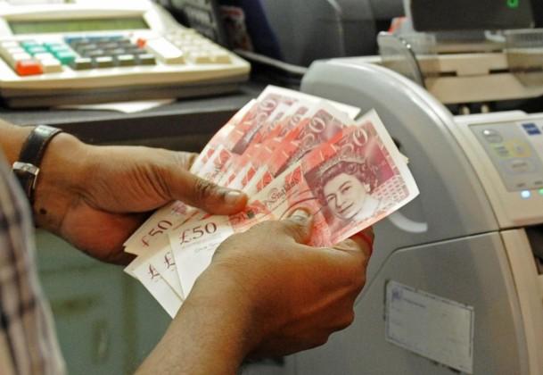 Pound falls sharply after Bank of England gives bond-buying end date ...