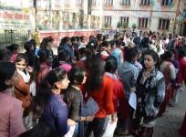 Students queue up outside their examination center as Bihar School Examination Board (BSEB) Class 12th exams begin, in Patna on Feb 3, 2020. (Photo: IANS)