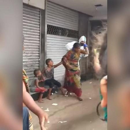 Screengrab from viral video of woman being manhandled Screengrab from viral video of woman being manhandled