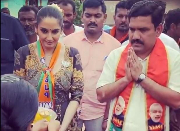 Ragini Dwivedi with BY Vijayendra during a by-poll campaign in KR Pet constituency. Ragini Dwivedi with BY Vijayendra