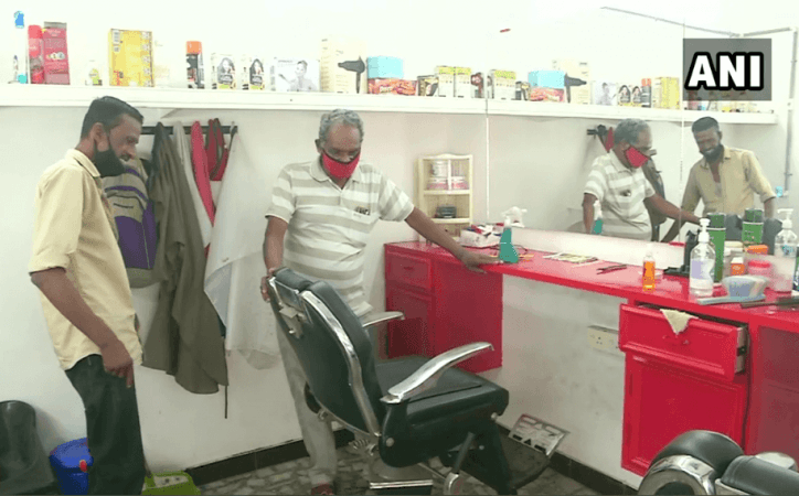 Gopi has three barbershops in the region. kerala barber shop