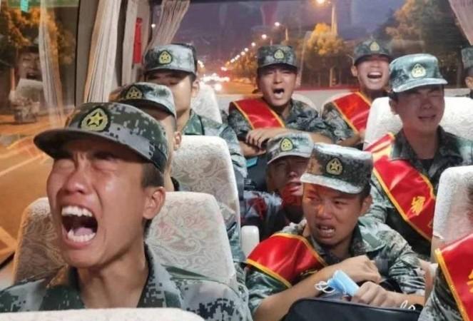 Viral video shows Chinese soldiers crying on way to India border Viral video shows Chinese soldiers crying on way to India border
