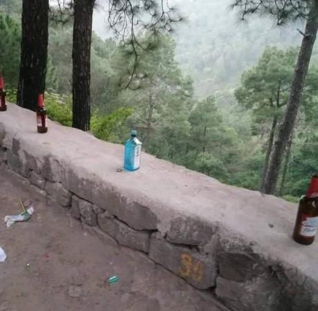 Liquor bottles left by tourists in Himachal Pradesh HP