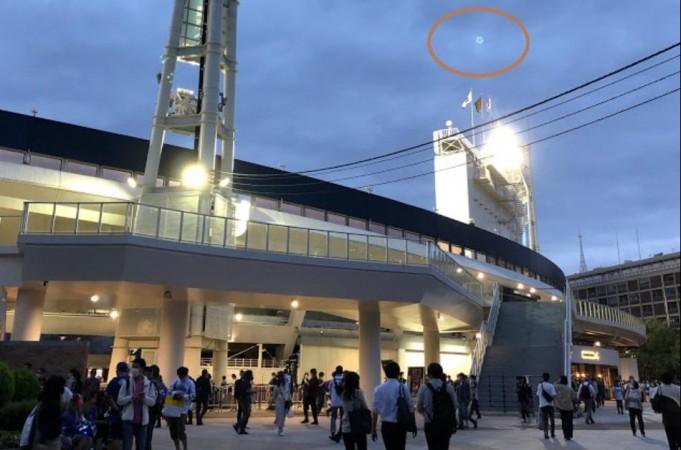 Multiple UFO orbs spotted over Japanese stadium; conspiracy theorist says aliens are observing - IBTimes India