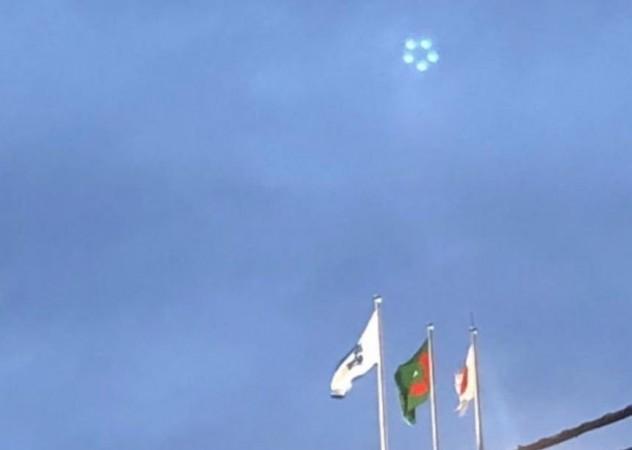 Multiple UFO orbs spotted over Japanese stadium; conspiracy theorist says aliens are observing - IBTimes India