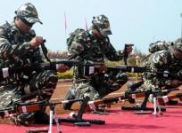 The new recruits of Central Armed Police Forces` Sashastra Seema Bal (SSB) contingent during their Passing Out Parade in Bhopal on Jan.3, 2014. Around 300 cadets from all over the country participated in the parade. (Photo: IANS)