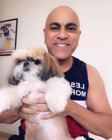 Baba Sehgal with shih tzu